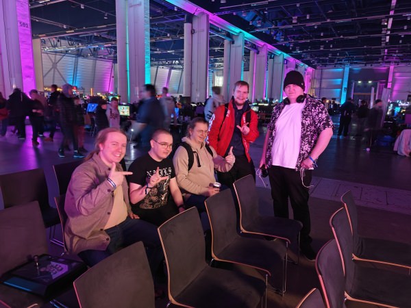 Group photo of Lahti FGC members Heikki, Juuso.exe, Keijo, Funz and YaBoiSpades at the Winter Assembly's Assymylly fighting game tournament